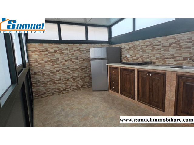 Riposto, via Libertà, elegante appartamento con terrazzo a livello e garage (CT)